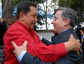 Rivals Hugo Chávez of Venezuela (left) and Álvaro Uribe of Colombia embrace at a July 2008 meeting