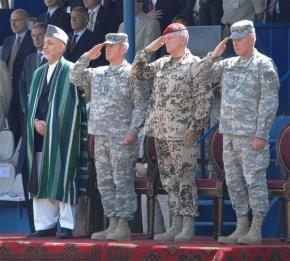 From left: Afghan President Hamid Karzai, U.S. Army Gen. Dan K. McNeill, German Gen. Egon Ramms, and U.S. Army Gen. David D. McKiernan
