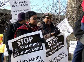 Anti-death penalty demonstrators march outside Baltimore's Supermax prison in December 2005