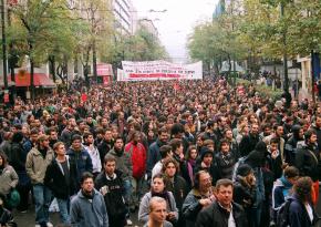 A mass protest against the Karamanlis government winds its way through the streets of Athens