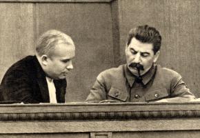 Joseph Stalin (right) sits with Nikita Khrushchev