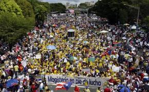 A mass march during Puerto Rico's one-day general strike drew tens of thousands
