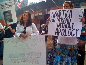 Protesters at a rally to defend abortion rights