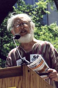 Dennis Brutus speaks at a global justice demonstration in 2004
