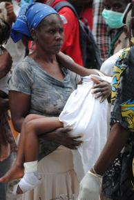 Haitians displaced by the earthquake wait for aid