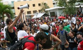 Students debate how to respond to an imminent police presence on the fifth day of the strike
