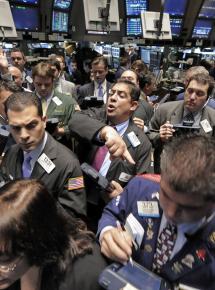 Wall Street traders on the floor of the New York Stock Exchange