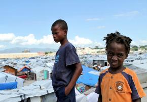 Two young Haitians still stuck at the La Piste refugee camp in Port-au-Prince