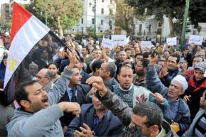 Protesters gather outside the parliament building in Cairo on Tuesday