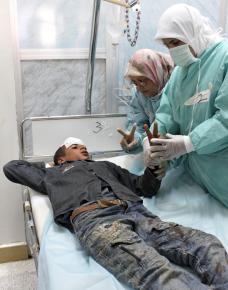 A 14-year-old boy injured by Qaddafi's forces outside of Brega