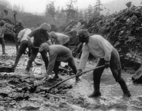Prisoners of a Soviet labor camp build a road in Kolyma