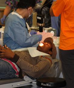 A patient receives dental treatment from Remote Area Medical