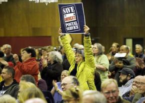Protesters pack a meeting in Vermont to discuss proposed cuts to the U.S. Postal Service