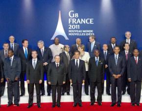 Top officials pose at 2011's G8 summit in France