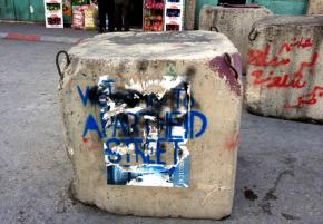 In Hebron, graffiti artists have renamed Shuhana Street “Apartheid Street”