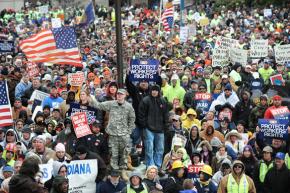 Union members and supporters mass around the Capitol building in Indianapolis to protest right to work legislation