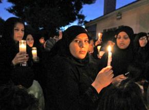 Mourners join in a vigil at the home of Shaima Alawadi