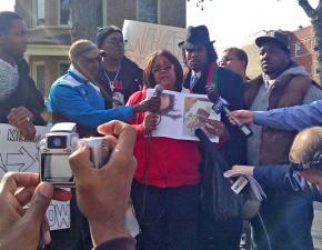 Angela Helton, Rekia Boyd's mother, speaks out among supporters at a rally in Douglas Park
