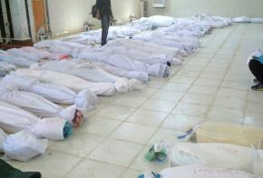 The bodies of civilians massacred in the city of Houla