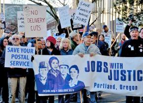 Postal workers and supporters rally against proposed cuts in Portland, Ore.