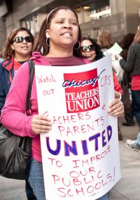 Teachers and parents picket outside a Chicago Board of Education meeting