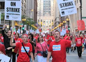 Chicago teachers march downtown on the first day of the stike