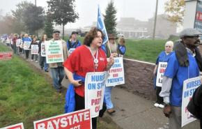Donna Stern (center, in red) joins other nurses on the picket line