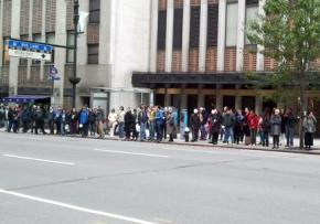 The line for the Second Avenue bus stretches half a block as transit service is restarted