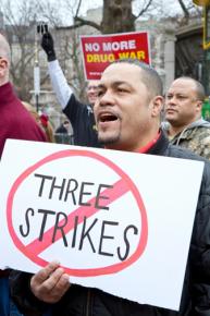 Protesters in Boston oppose the new three strikes law