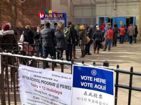 Waiting to cast a ballot in New York City where the aftermath of Hurricane Sandy disrupted voting