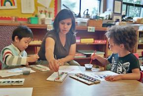 A Portland preschool teacher with her students