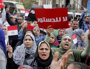 Protesters mass outside Egypt's Presidential Palace to decry Morsi's power grab