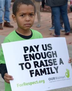 Wal-Mart workers and their families take part in the national Black Friday day of action in 2012