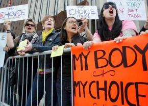 Abortion rights activists rally against restrictions on reproductive rights