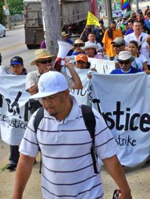 Palermo workers march to mark the one-year anniversary of their strike