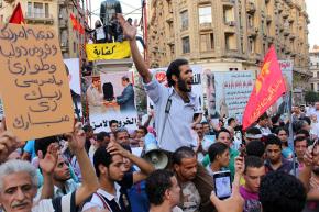 Protesters rally against Morsi's IMF deals and the detention of political prisoners