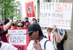 Parents and other activists march against racist school closures in Chicago