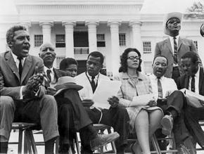 Civil rights leaders at the 1965 Selma to Montgomery march. Bayard Rustin and A. Philip Randolph are seated at left; Martin Luther KIng is second from the right
