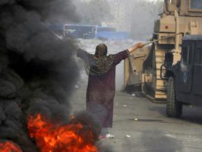 Supporters of the Muslim Brotherhood face a military attack in Cairo