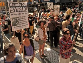 Protesters in New York City march against U.S. threats to attack Syria