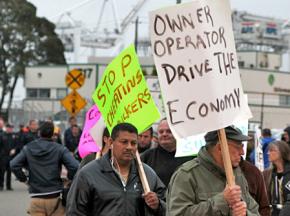 Port of Oakland truck drivers rally with supporters on the picket line