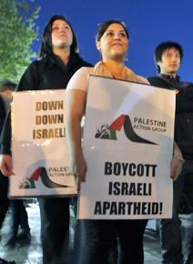 Activists stand for boycott, divestment and sanctions against Israeli apartheid