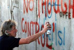 Roger Waters adding his lyrics to the protest art on Israel's apartheid wall