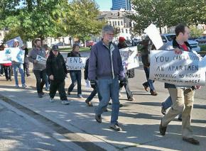 Activists take part in a homeless awareness march in Cincinnati