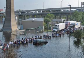 Residents flee New Orleans in the aftermath of Hurricane Katrina