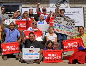 Members of the Cowboy Indian Alliance join with other climate justice activists at a Nebraska protest