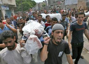 Gazans march in a funeral procession for a victim of Israel's war