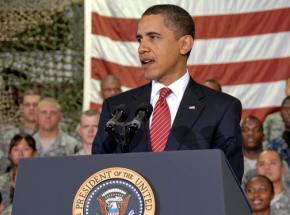 Barack Obama speaking in front of U.S. troops