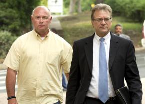 Charles Kleinert (left) arrives at the courthouse to face charges of killing Larry Jackson Jr.