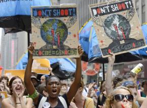 Marchers in the massive climate justice demonstration in New York City